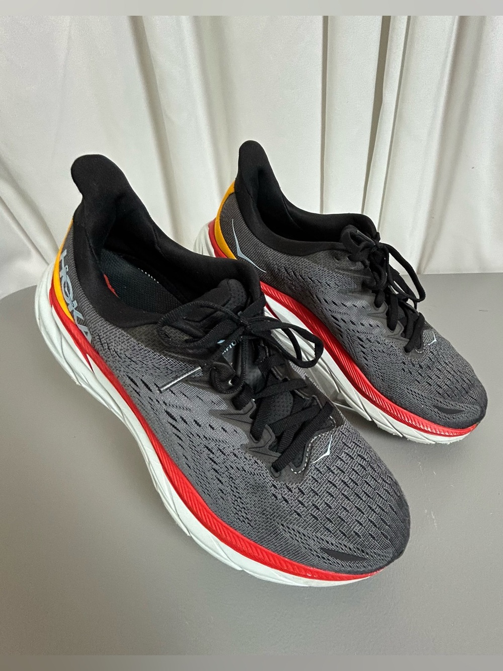 Hoka Grey men’s Running Shoe with Red and Black Accents size 10D